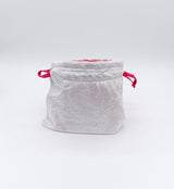 White and pink makeup bag